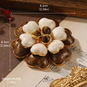 Vintage floral brooch with marble texture petals, measuring 6.2cm and weighing 45.65g