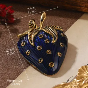 Vintage blue enamel strawberry brooch with gold details showing dimensions and weight