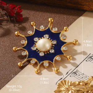 Close-up of luxury vintage geometric flower brooch with blue enamel and central pearl