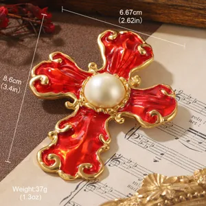 Vintage red enamel cross brooch with large pearl detail, dimensions 8.6cm x 6.67cm