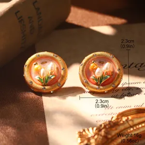 Detail view of 2.3cm French vintage enamel earrings with pearl tulips and weight info