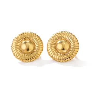 Detailed view of gold stainless steel shell-style stud earrings with spiral texture