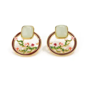 Elegant enamel flower earrings with square green stone and pearls in a gold circle design
