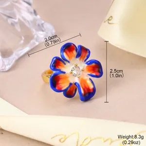 Detail view of colorful enamel flower ring with 2.5cm diameter and 8.3g weight.