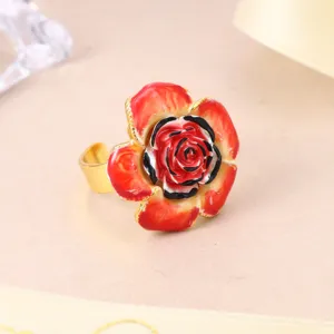 Macro detail of a high-end red enamel rose flower adjustable open ring for women