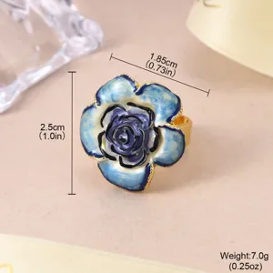 Close-up detail of a blue enamel rose adjustable ring showing dimensions and weight