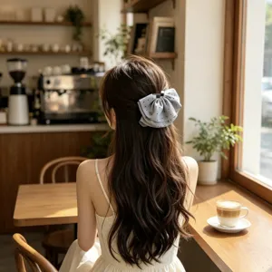 Elegant light grey polka dot bow hair claw clip for simple French-style everyday styling
