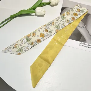 Detail of a vintage French-style floral print silk ribbon for hair styling.