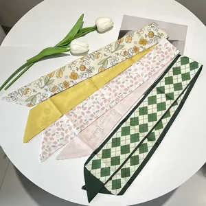 Collection of French style silk streamers with various patterns like floral and argyle.