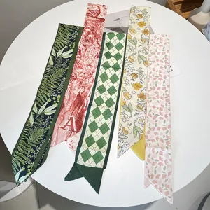 Detail view showing variety of vintage French style silk hair ribbons with floral prints