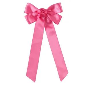 Handmade sweet pink satin ribbon bow hair clip with rose flower and long streamers.