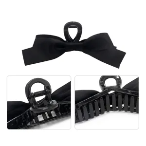 Hepburn style black silk ribbon bow hair claw clip for elegant updos and French hair styles