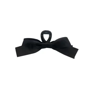 Hepburn style black ribbon bow hair claw clip for elegant women's updo hair styling