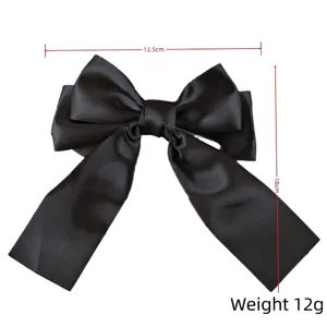 Black ribbon bow hair clip with dimensions 13.5x18cm and 12g weight