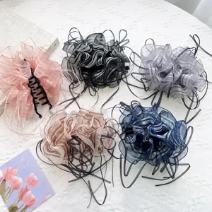 Assorted elegant striped ruffle ribbon hair banana clips shown in five chic colors.