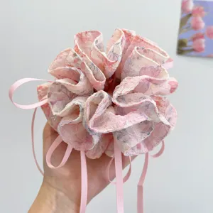 Large floral print scrunchie with long pink ribbons for forest style hair styling