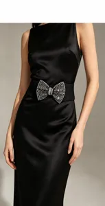 Rhinestone bow elastic waist belt detail view showcasing the elegant design and sizing specs.