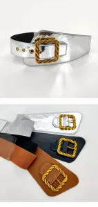 Detailansicht des breiten elastischen Damengürtels mit dekorativer goldener Schnalle.