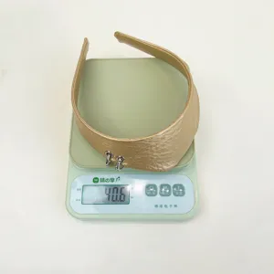 Peso della fascia in pelle dorata con anelli d'argento - 40,6g vista dettaglio