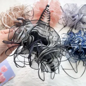 Elegant Korean-style ruffled banana hair clip accessory with striped gauze ribbons detail