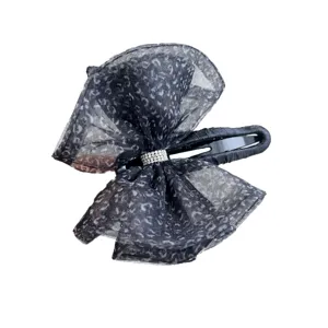 Pinza para el pelo retro con lazo de malla de leopardo y diamantes de imitación