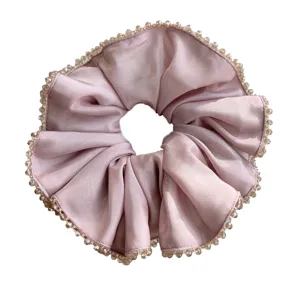 Elegant dusty rose satin scrunchie with sparkling crystal beaded trim for bun hairstyles