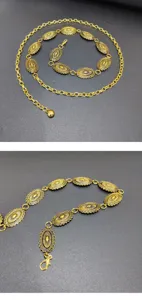 Vintage gold chain belt for women, ornate oval metal waist chain for dresses and chic outfits.