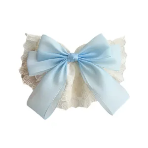Large Korean style double-layer lace bow hair clip for women in light blue and cream color
