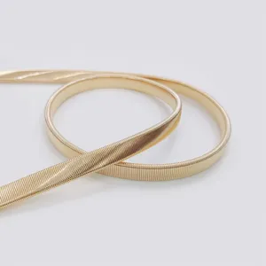 Gold elastic waist belt for women, stylish metal snake chain dress accessory for dresses.