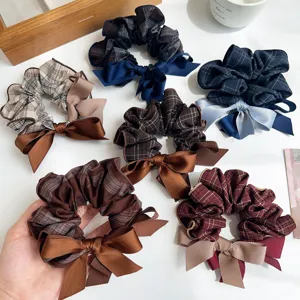 Collection of elegant plaid bow scrunchies in various vintage autumn colors