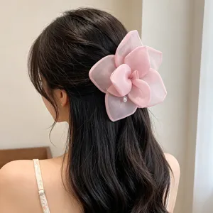 Elegant large pink gauze rose flower hair clip for romantic hairstyle styling detail view