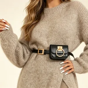 Stylish black leather waist belt with small round ring pouch for women fashion accessory.