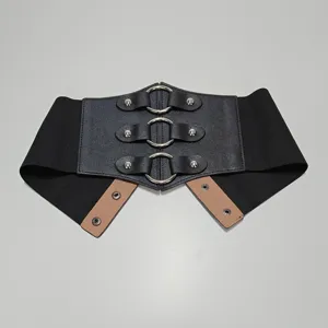 Women's wide elastic corset belt with metal O-rings, rivets and snap buttons for dresses.