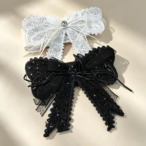 Elegant women's wide stretch waist belt featuring large lace bow and sparkling rhinestone details.