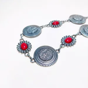 Bohemian metal waist chain with red stone embellishment, perfect for dresses and sweaters.