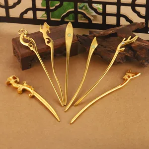 Detailed macro shot of elegant gold Hanfu hairpins with dragon and cloud motifs.