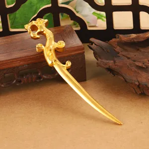 Detailed macro view of an intricate golden dragon hairpin for traditional Hanfu styling