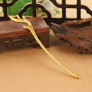 Elegant gold antler hair stick with rhinestone detail, perfect for Hanfu styling.