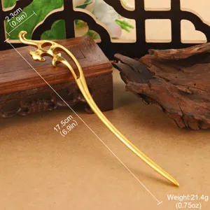 Macro detail of a golden hollow dragon hair pin showing dimensions and weight specs
