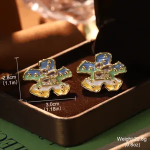 Enamel flower earrings from oil painting series with size and weight measurements in a box.
