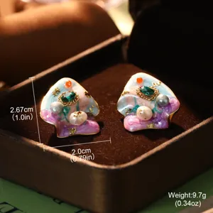 Detailed macro view showing colorful enamel pearl earrings with size and weight specs