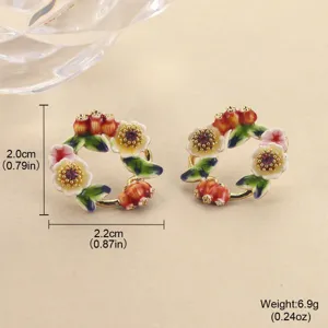 Detailed view of floral enamel earrings showing size and weight specifications.