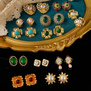 Collection of exquisite vintage royal style earrings featuring pearls and floral designs