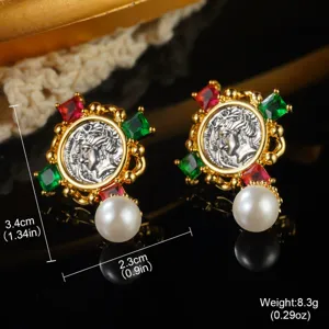 Close-up detail of vintage court-style gold earrings with portrait coin and pearl