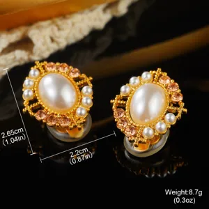 Vintage court style oval pearl earrings with gold frame, amber rhinestones, and size markers.