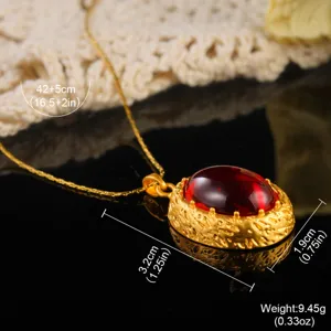 Vintage gold palace style necklace pendant with large red stone, dimensions and weight details.