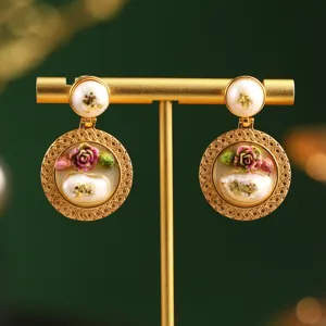 Detailed view of vintage Monet garden earrings with pearls and roses. (70 chars)