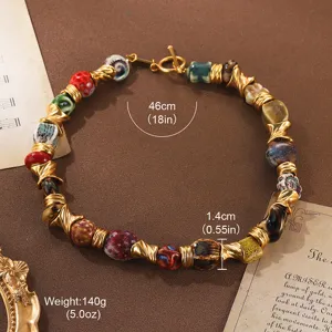 Vintage heavy design necklace with colorful glazed beads and gold textured metal spacers