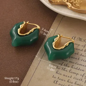 Detailed macro view of vintage green enamel hoop earrings with size and weight specs