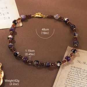 Detailed specs of vintage natural stone necklace showing 48cm length and 62g weight.